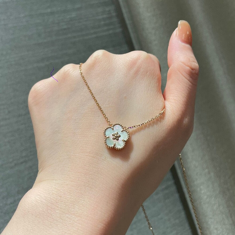V*n Cl**f & Arpels Lucky Spring pendant, plum blossom