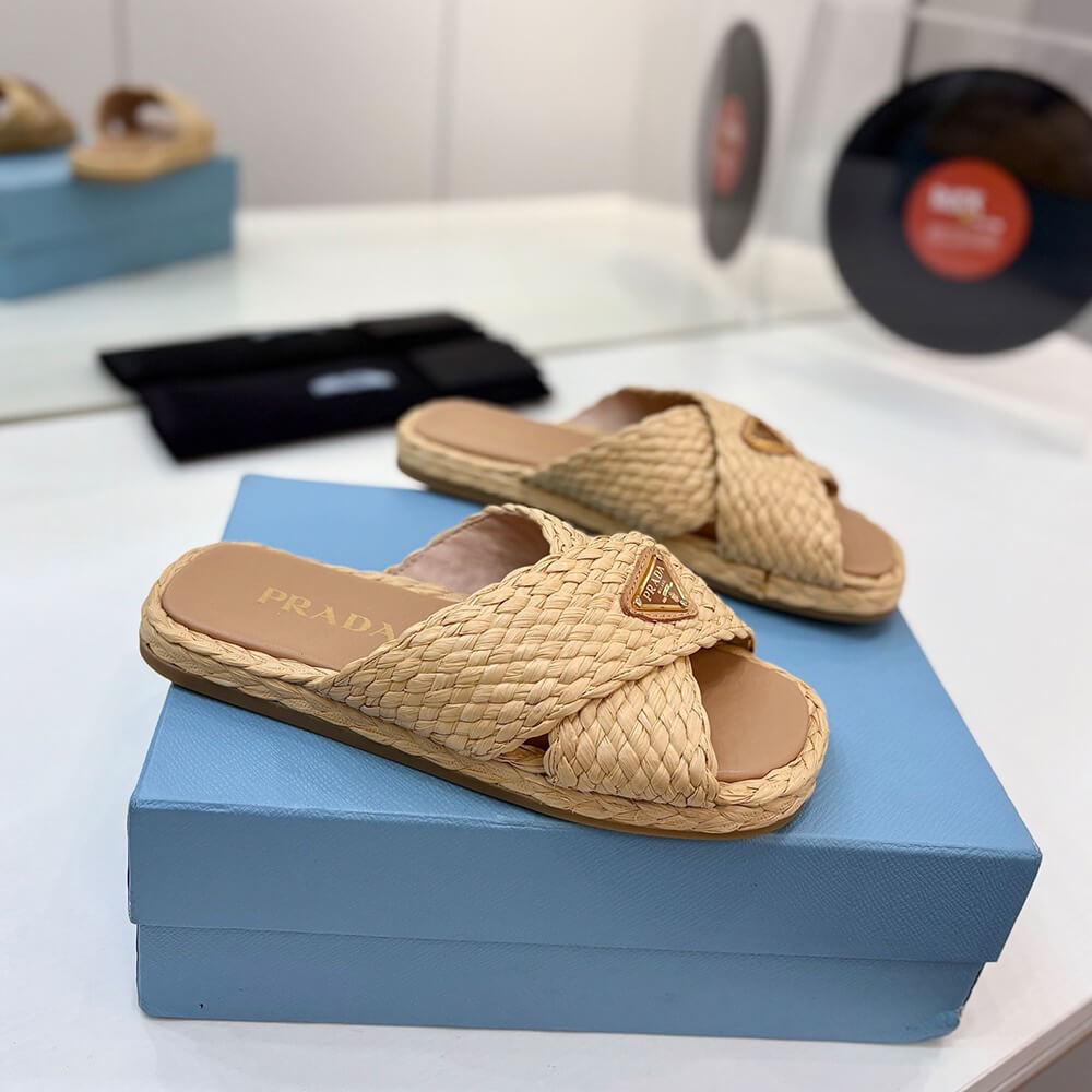 Pra*a Raffia crisscross slides
