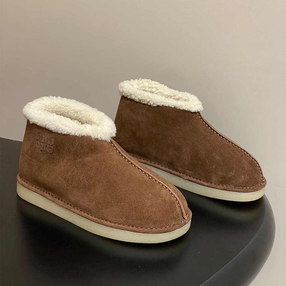 M1um1u Suede and shearling slip-on booties