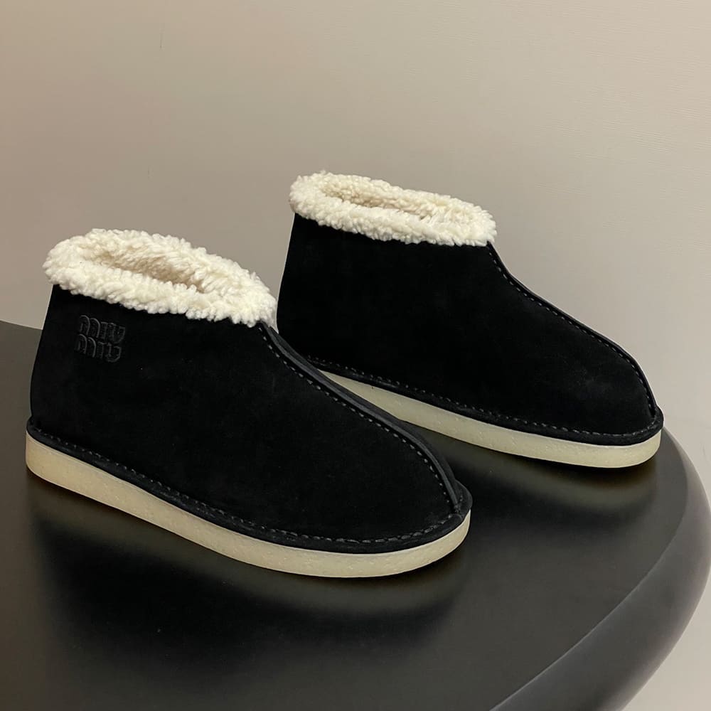 M1um1u Suede and shearling slip-on booties