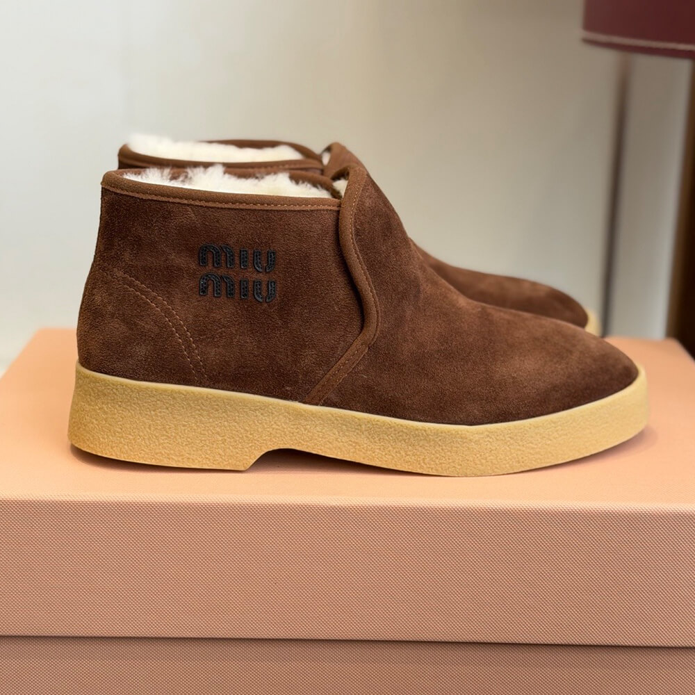 M1um1u Suede and shearling slip-on booties