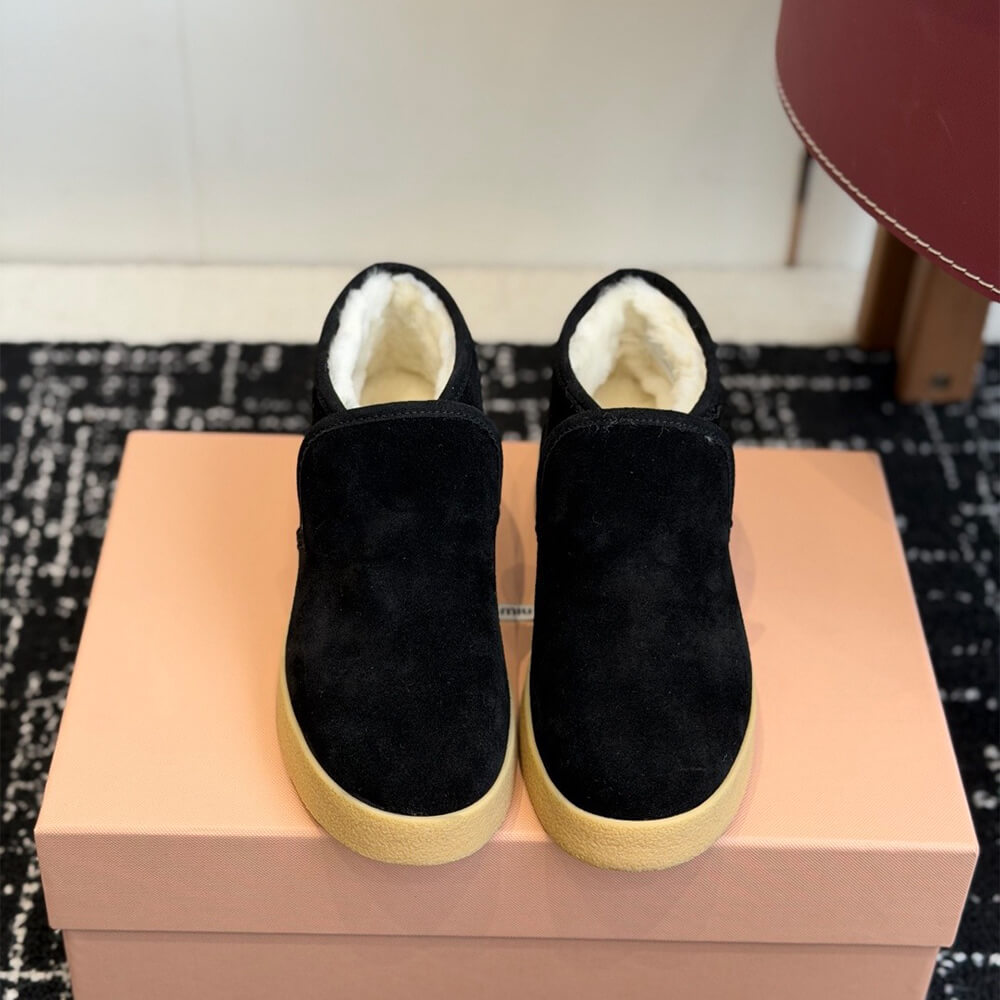 M1um1u Suede and shearling slip-on booties