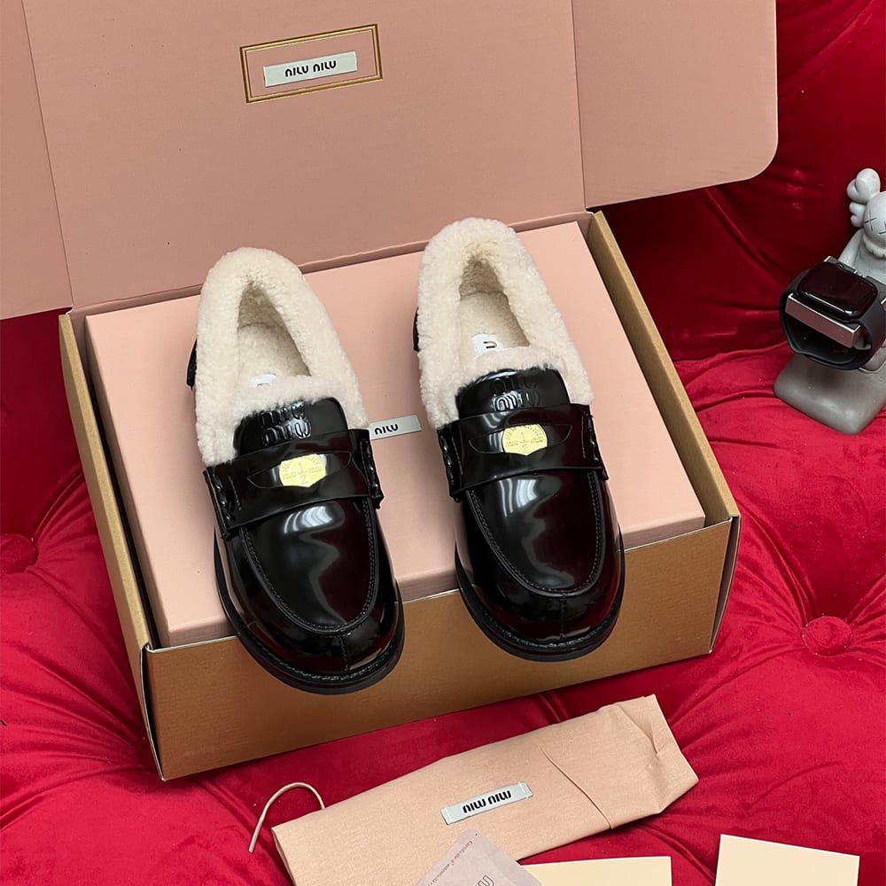 M1um1u Bleached leather and shearling penny loafers