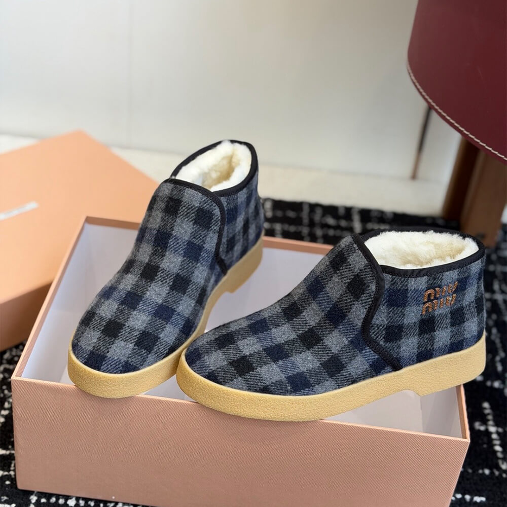 M1um1u Wool and shearling slip-on booties