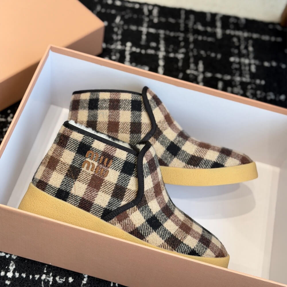M1um1u Wool and shearling slip-on booties