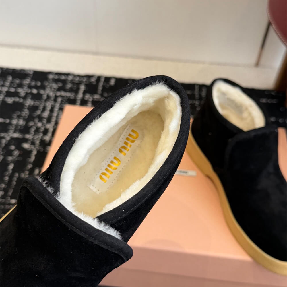 M1um1u Suede and shearling slip-on booties