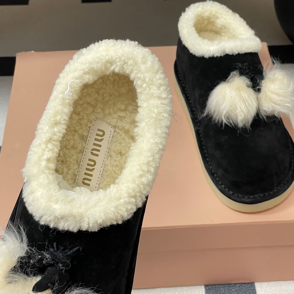 M1um1u Suede and shearling mules