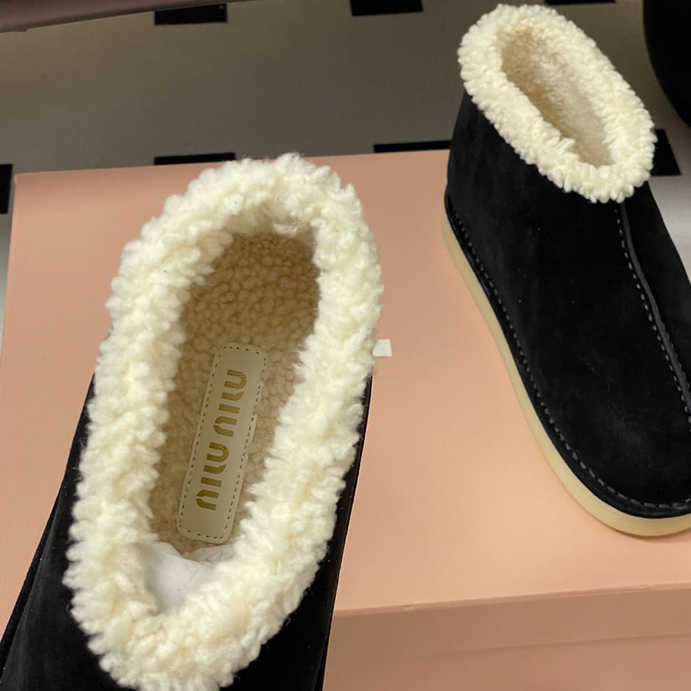 M1um1u Suede and shearling slip-on booties
