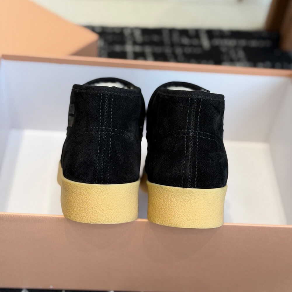 M1um1u Suede and shearling slip-on booties