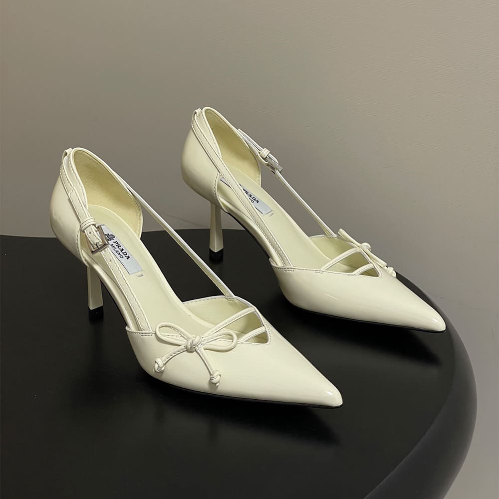 Pra*a Open-side leather pumps
