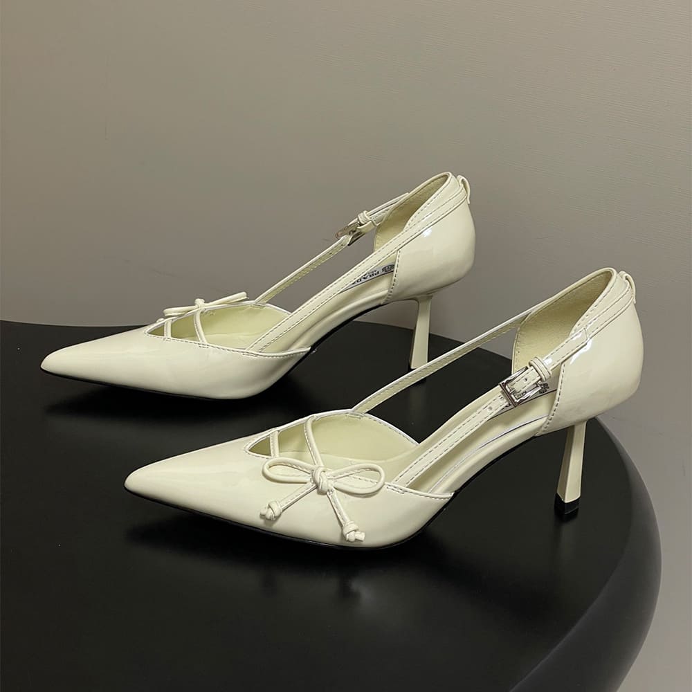 Pra*a Open-side leather pumps