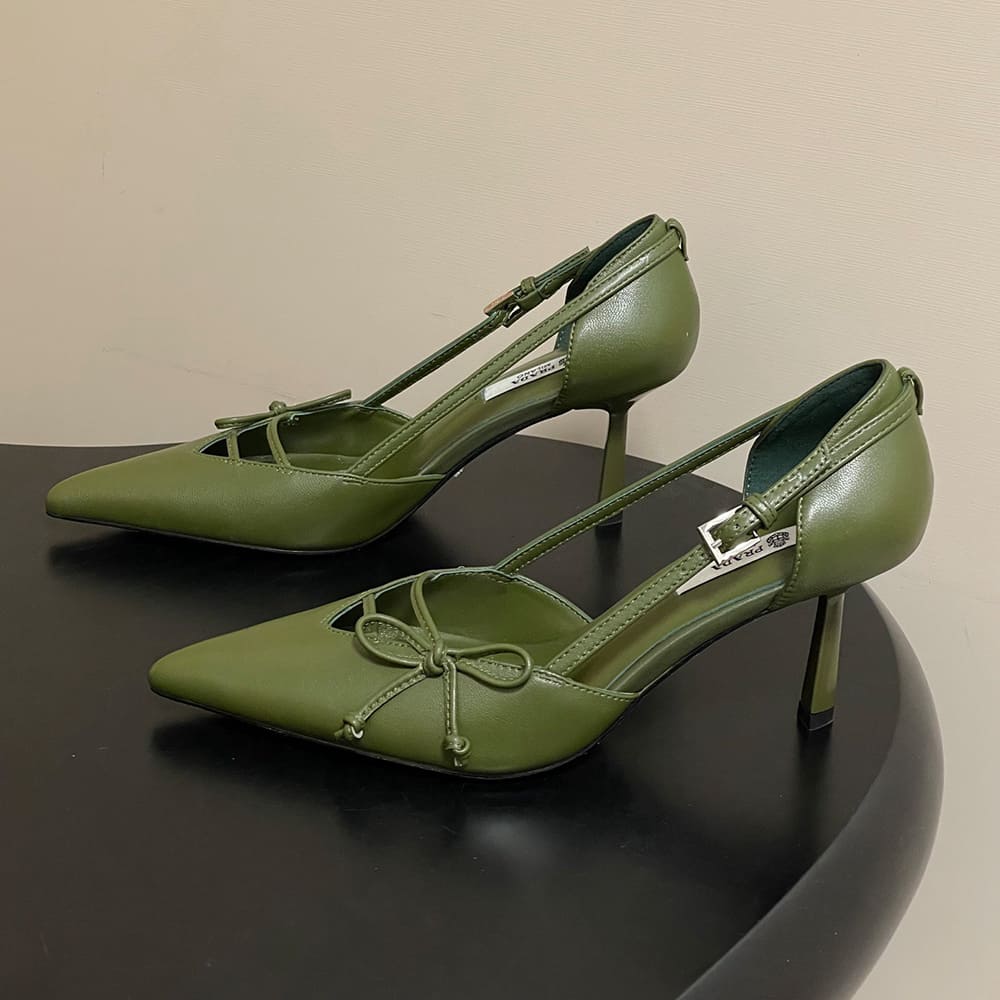Pra*a Open-side leather pumps